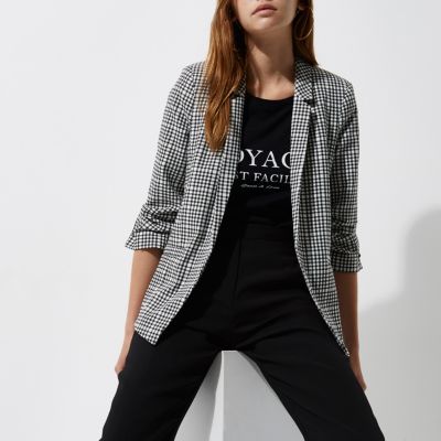 Black dogtooth check bar cuff blazer