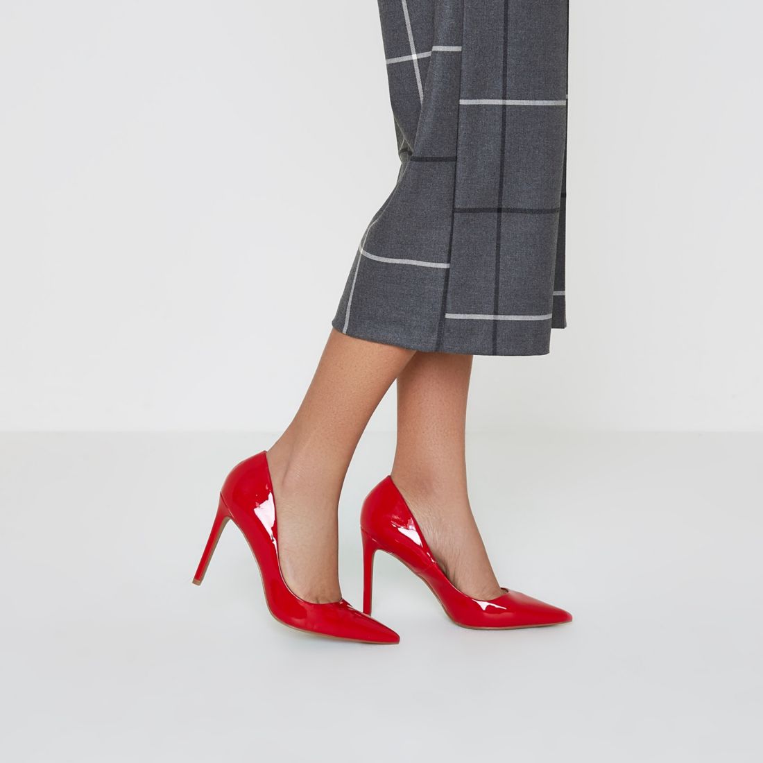 Red patent court shoes