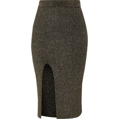 Jupe mi-longue ajustée en lurex surpiqué noir et or