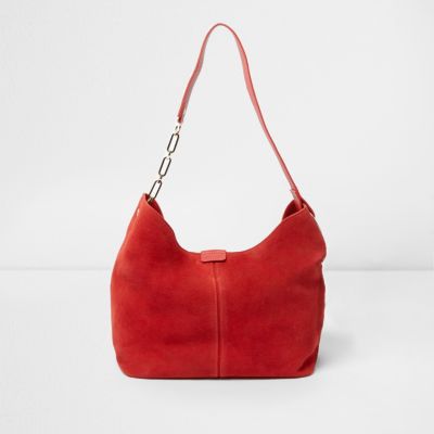 Red suede chain link handle slouch bag