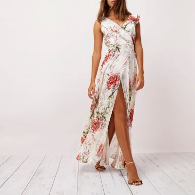 River Island CrÃ¨me maxi-overslagjurk met ruches en bloemenprint