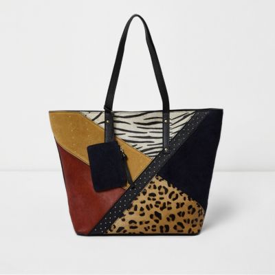 Gele leren handtas met patchwork en studs