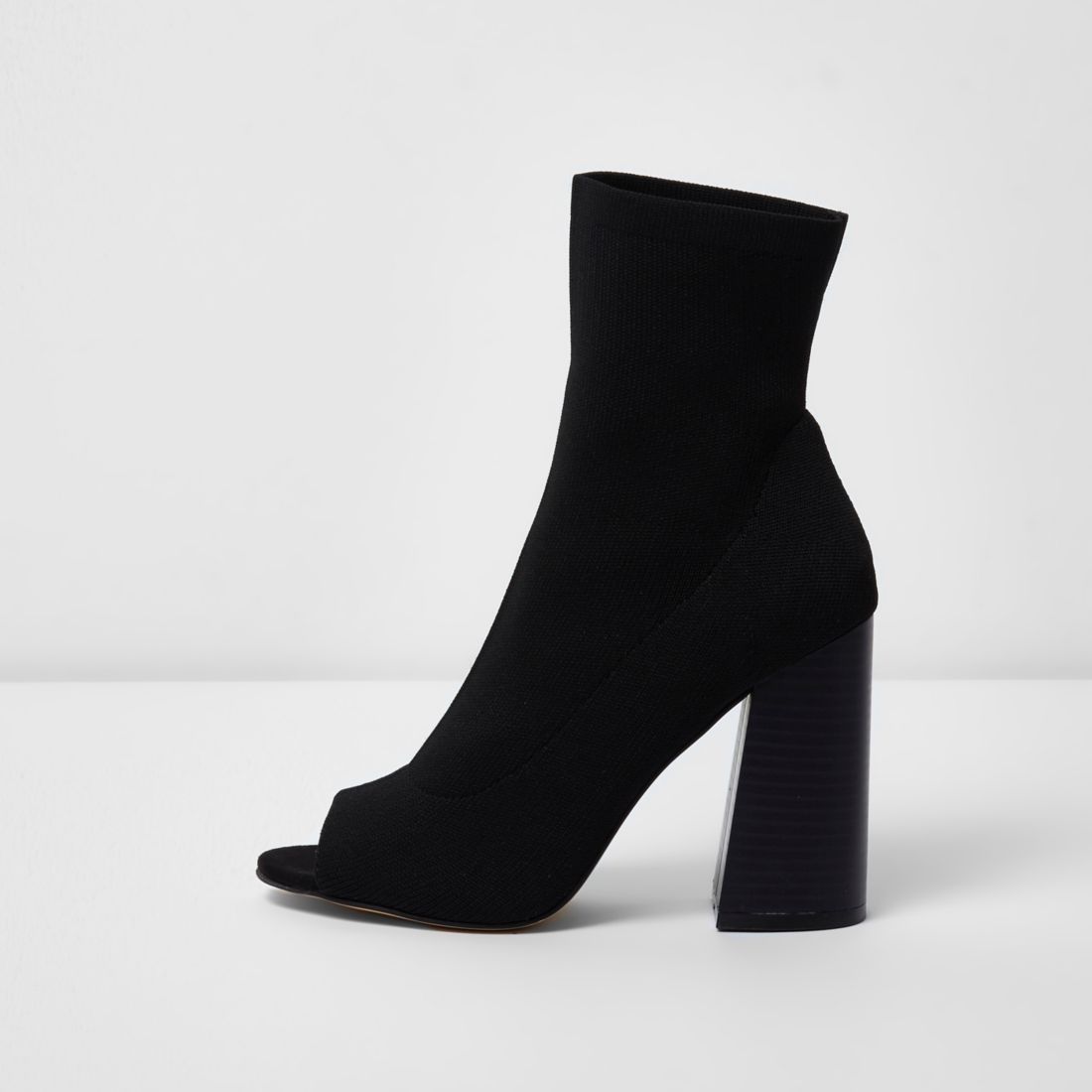 Black peep toe heeled knit sock boots