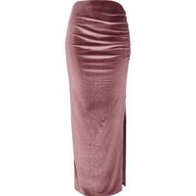 Jupe longue en velours rose clair à fronces sur le côté