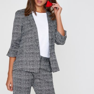 Grijze geruite blazer met manchetten