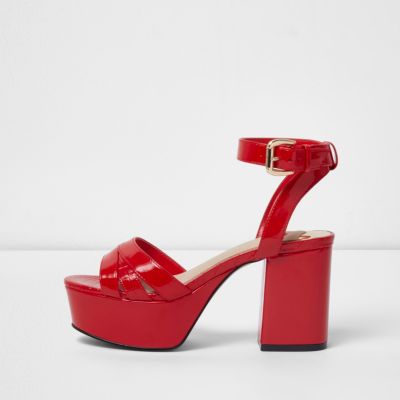 Red patent platform block heel sandals