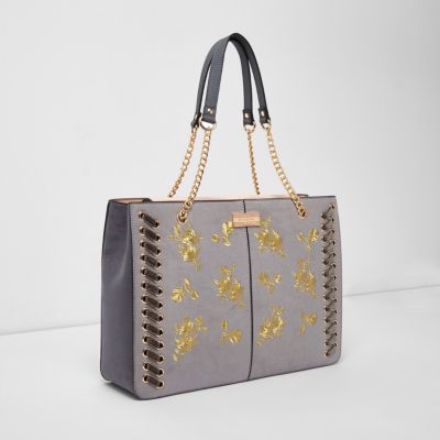 Grijze geborduurde handtas met bloemenprint en ketting