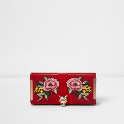 Portefeuille à rabat rouge motif tête de léopard à rose appliquée