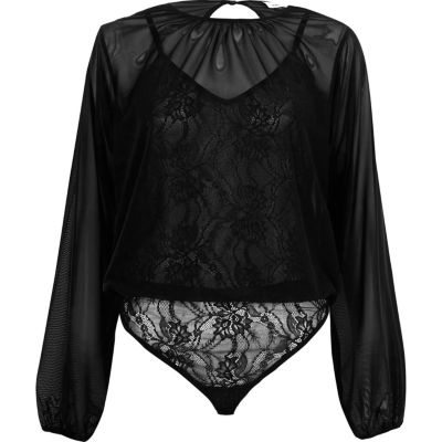 Zwarte mesh bodysuit met kanten onderlaag en lange mouwen