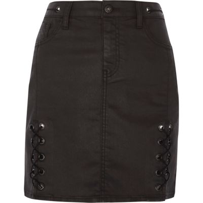 Black coated lace-up mini skirt