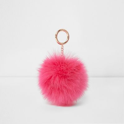 Roze sleutelhanger met pompon en veer