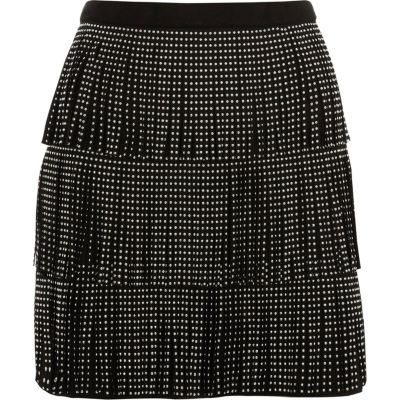 Minirock aus Wildlederimitat mit Nieten und Fransen