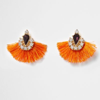 Oorbellen met oranje kwastje en siersteentjes