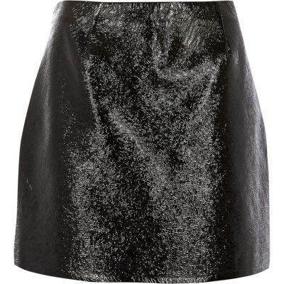 Mini-jupe en vinyle noir