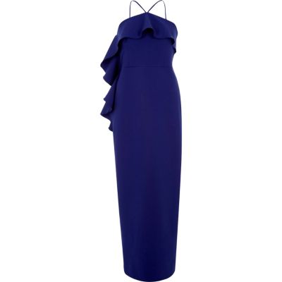 Robe moulante bleue à volants et encolure croisée