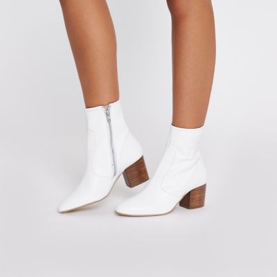 White leather block heel ankle boots