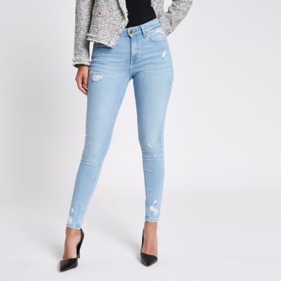 super skinny blue ripped jeans womens