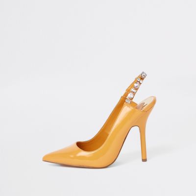 Yellow jewel embellished court shoes