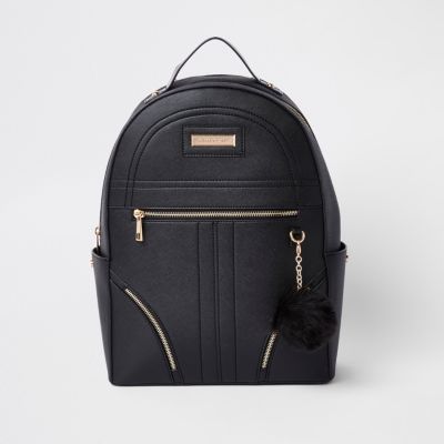 Black pom pom zip front backpack
