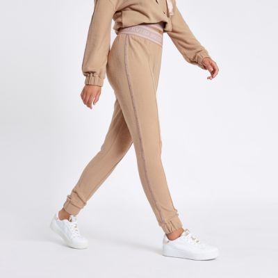 beige jogging pants