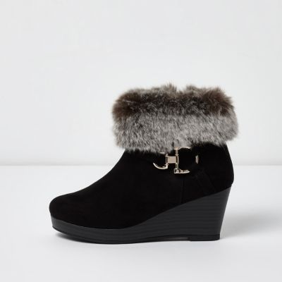 black heeled boots with fur trim